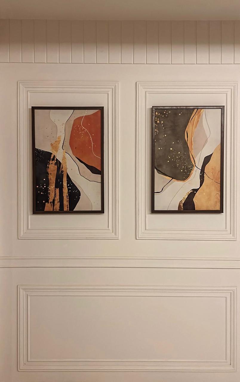 Canvas artwork hanging above a sofa in a Pune apartment