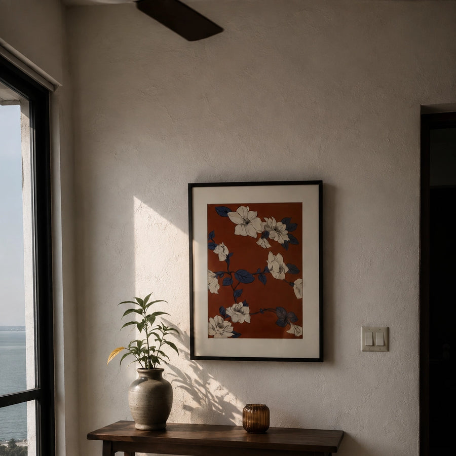 Framed Vaera Living print on a textured wall in a Mumbai apartment